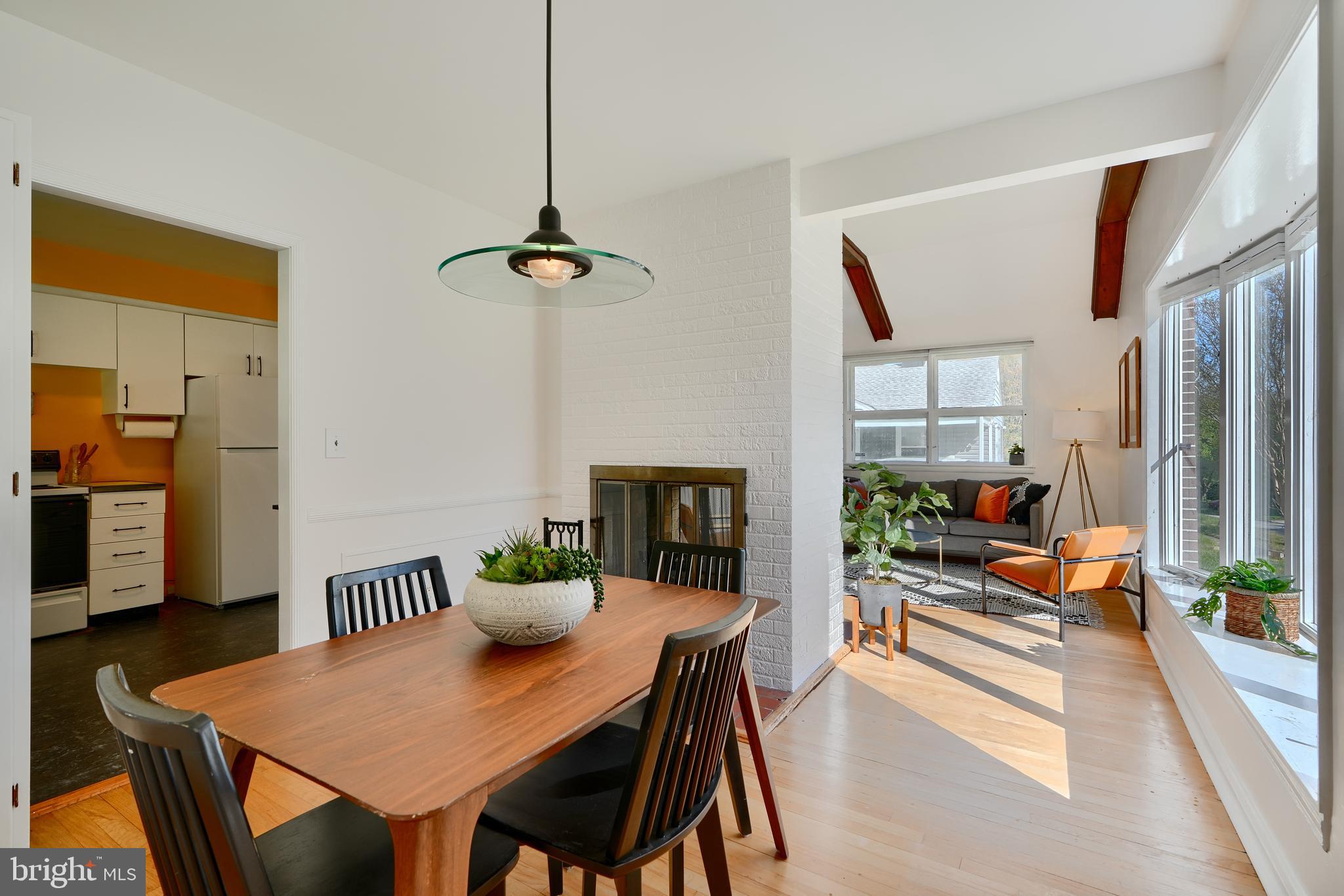 1316 Glendale Road Baltimore, MD 21239 - Photo 9 of 37 a view of a dining room with furniture window and wooden floor