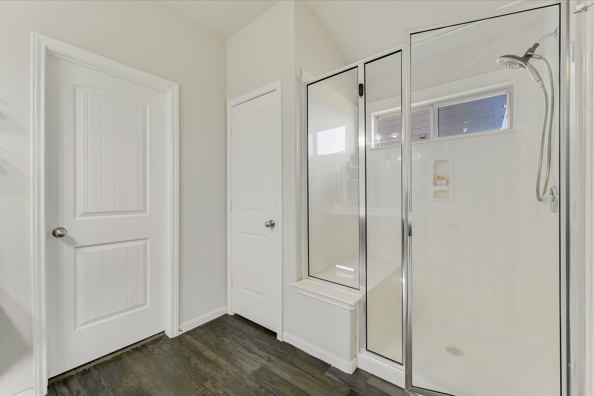 725 Pinnacle Drive Georgetown, TX 78626 - Photo 12 of 20 a bathroom with a glass shower door