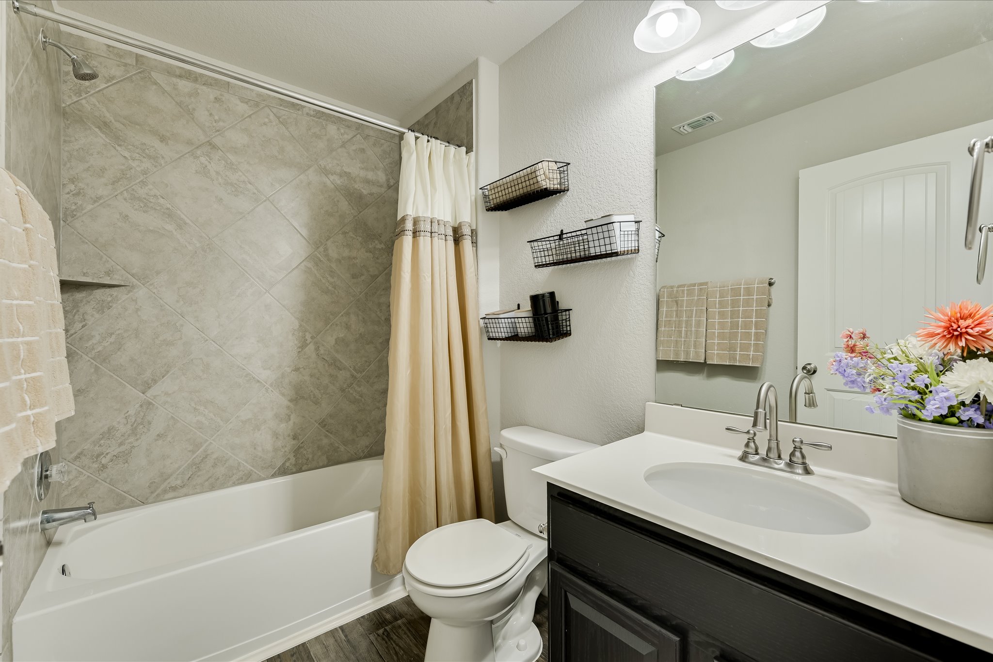 725 Pinnacle Drive Georgetown, TX 78626 - Photo 14 of 20 a bathroom with a sink toilet and shower