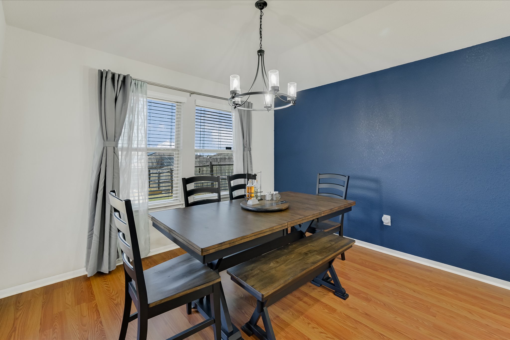 725 Pinnacle Drive Georgetown, TX 78626 - Photo 8 of 20 a view of a dining room with furniture window and wooden floor