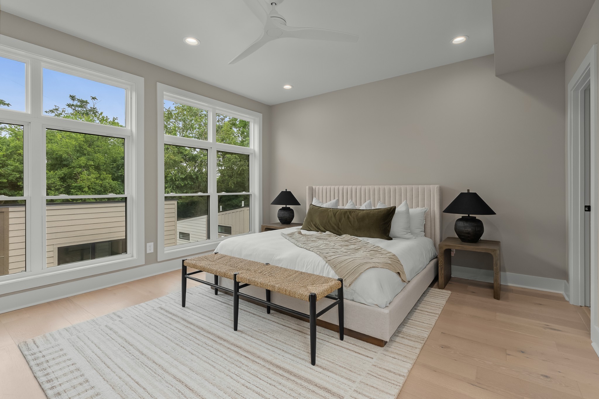 2305 Eastland Avenue, Unit G Nashville, TN 37206 - Photo 16 of 44 a bed sitting in a spacious bedroom next to a window