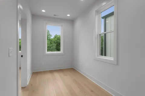 an empty room with windows