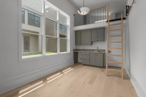 a front view of a house with garage