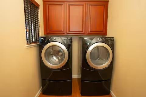 1180 Sanborn Road Yuba City, CA 95993 - Photo 11 of 26 a utility room with dryer and washer