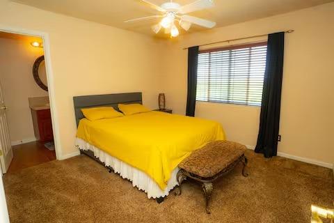 1180 Sanborn Road Yuba City, CA 95993 - Photo 14 of 26 a bed room with a bed and a window