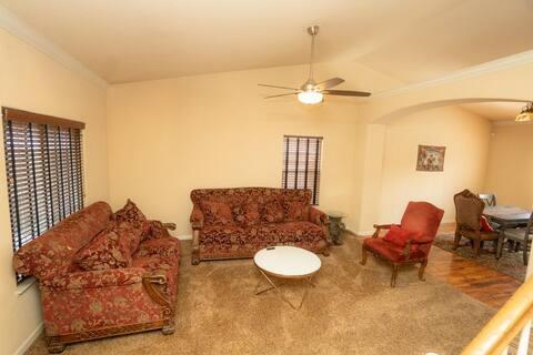 1180 Sanborn Road Yuba City, CA 95993 - Photo 7 of 26 a living room with furniture a table and a window