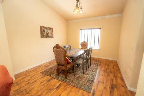 1180 Sanborn Road Yuba City, CA 95993 - Photo 8 of 26 a view of a dining room with furniture and a window