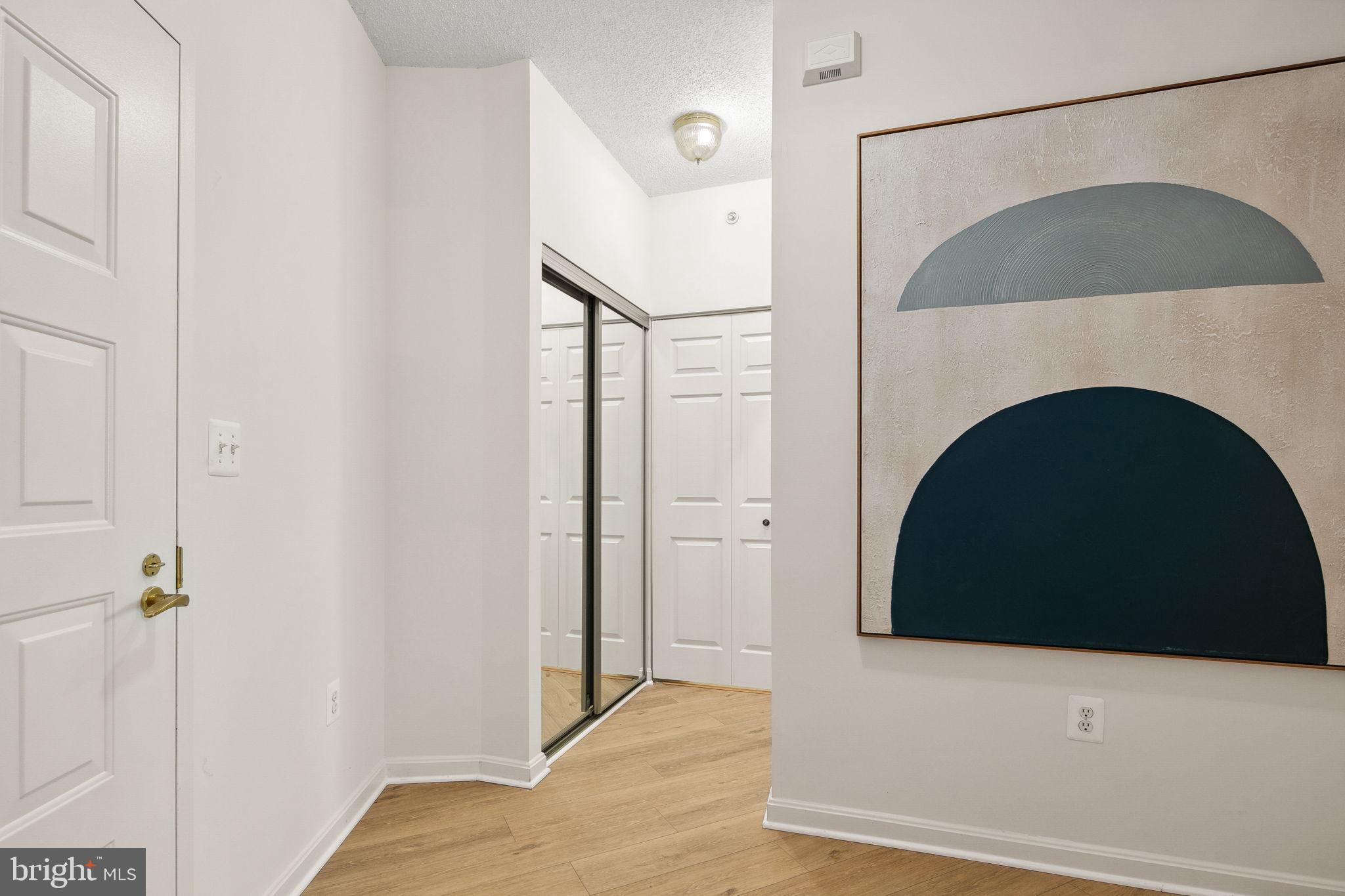19355 Cypress Ridge Terrace, Unit 803 Leesburg, VA 20176 - Photo 3 of 38 a view of a door in the house