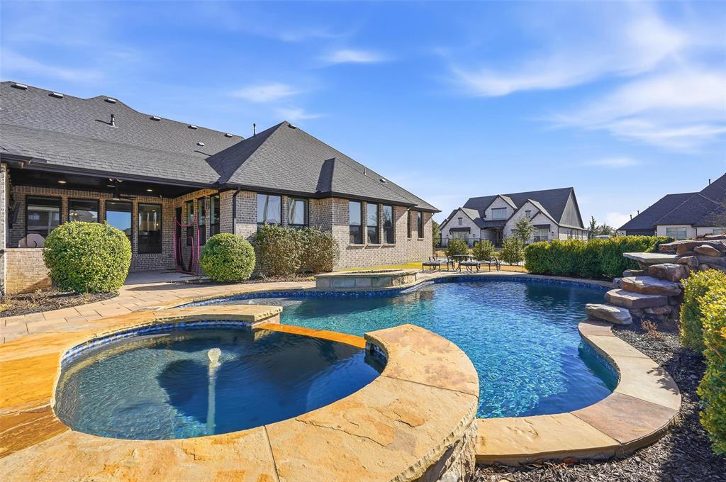 640 Maggie Trail Lucas, TX 75002 - Photo 32 of 40 a view of a house with swimming pool