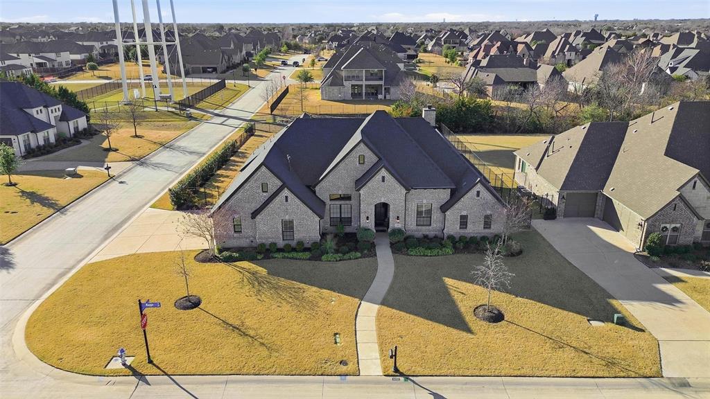 640 Maggie Trail Lucas, TX 75002 - Photo 36 of 40 an aerial view of a house with swimming pool