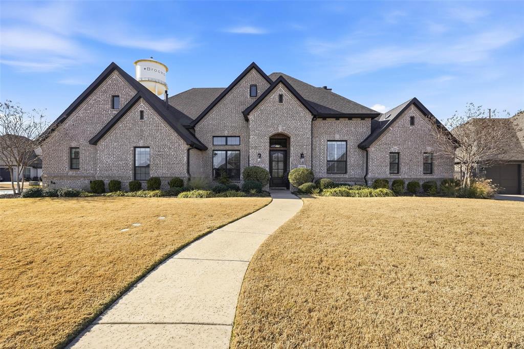 640 Maggie Trail Lucas, TX 75002 - Photo 38 of 40 a front view of a house with a yard