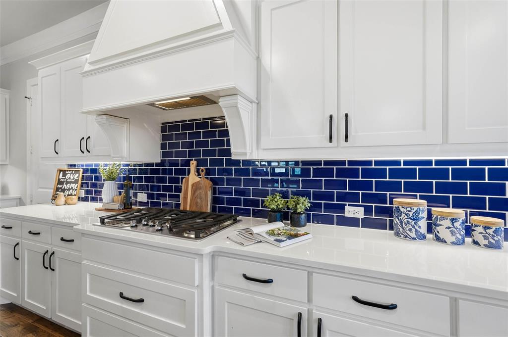640 Maggie Trail Lucas, TX 75002 - Photo 10 of 40 a kitchen with a cabinets and a stove