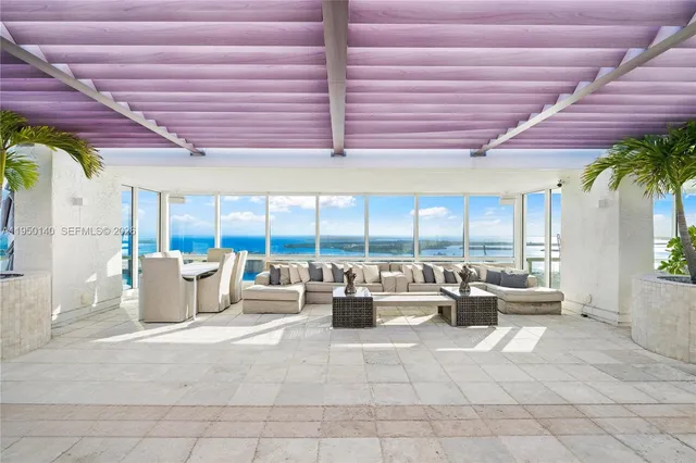 a view of a balcony with an ocean view