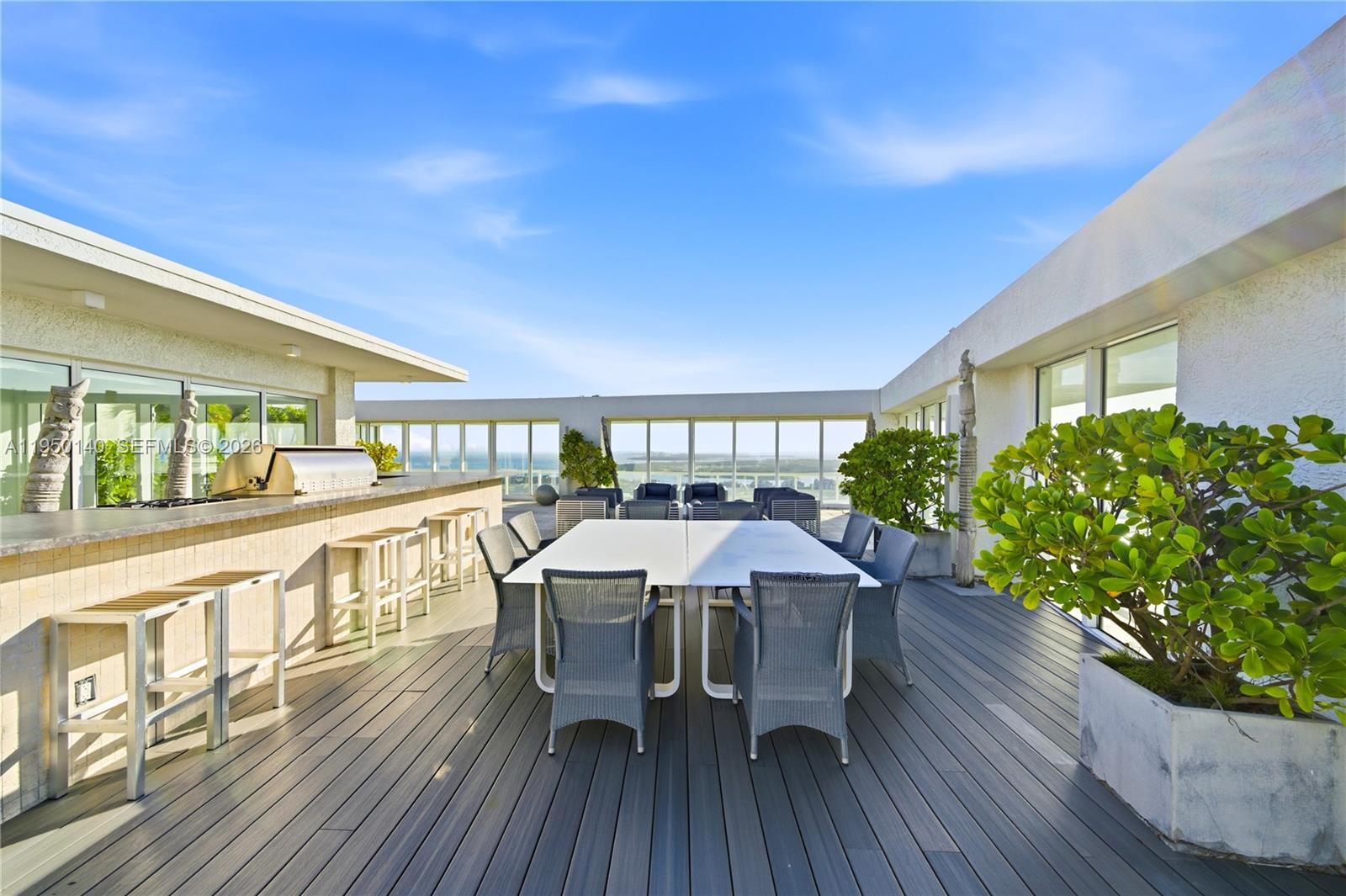 450 Alton Road, Unit PH1 Miami Beach, FL 33139 - Photo 23 of 98 a view of a house with patio and wooden floor