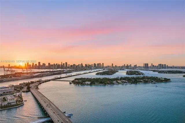 a view of swimming pool with outdoor seating and city view