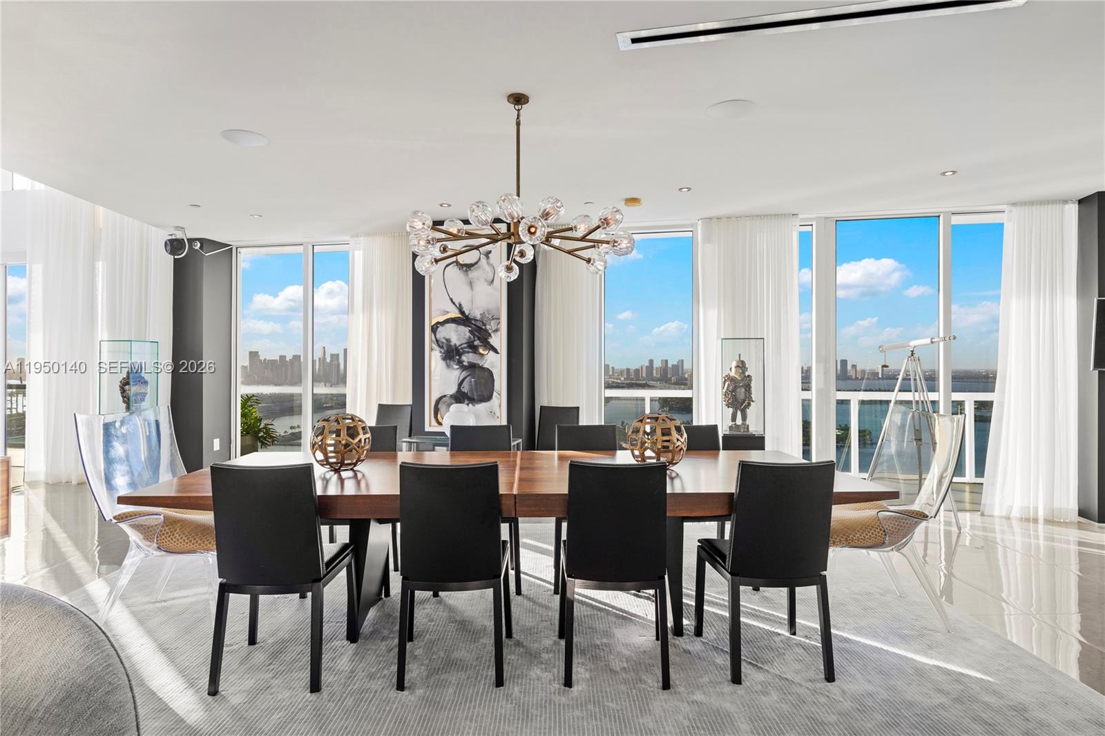 450 Alton Road, Unit PH1 Miami Beach, FL 33139 - Photo 36 of 98 a view of a dining room with furniture window and outside view