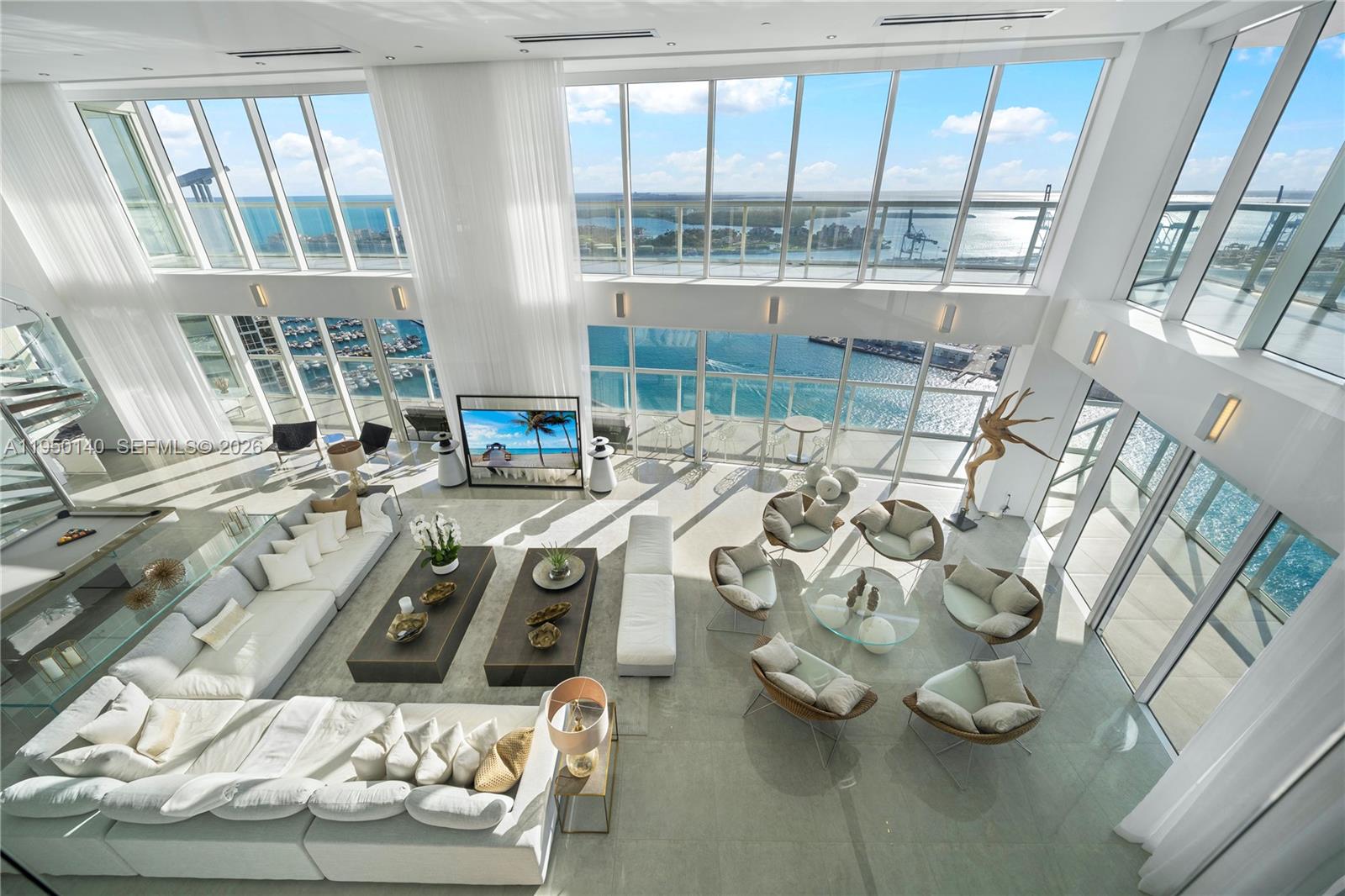 450 Alton Road, Unit PH1 Miami Beach, FL 33139 - Photo 5 of 98 a view of living room with furniture and floor to ceiling window