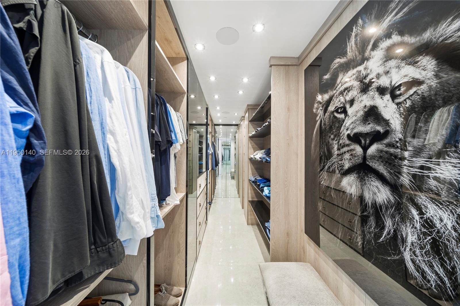 450 Alton Road, Unit PH1 Miami Beach, FL 33139 - Photo 53 of 98 a view of a hallway with wooden floor and stairs