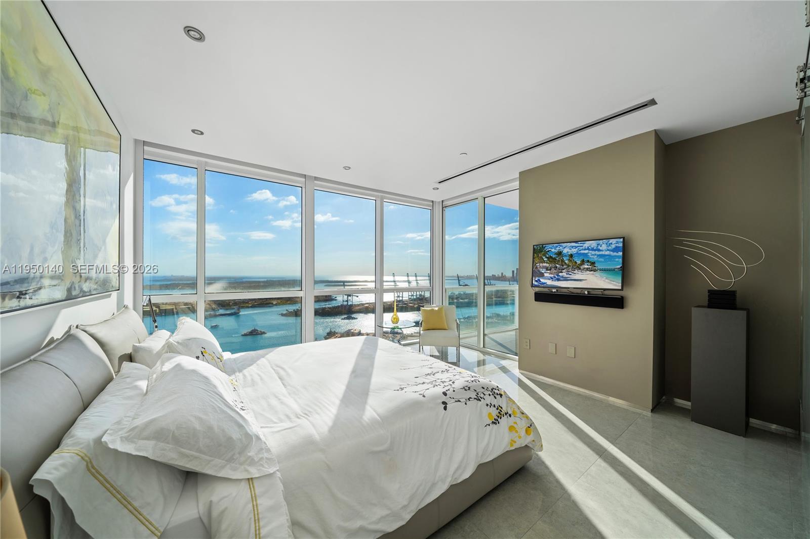 450 Alton Road, Unit PH1 Miami Beach, FL 33139 - Photo 71 of 98 a living room with furniture and large windows