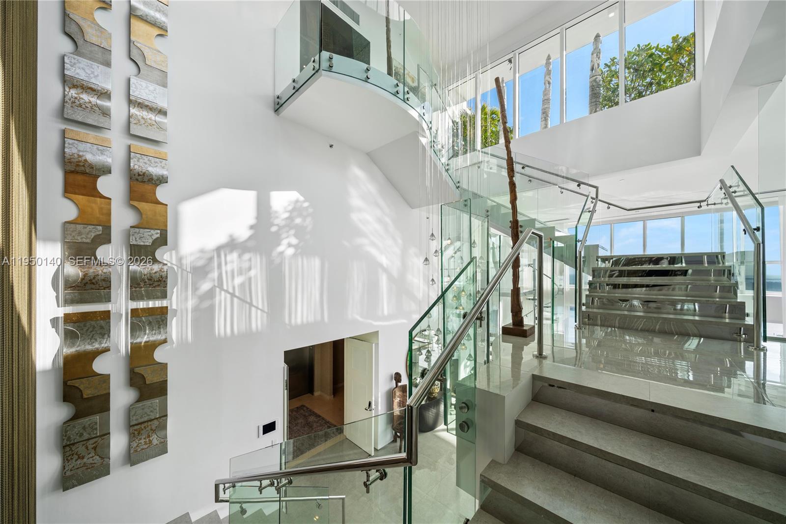 450 Alton Road, Unit PH1 Miami Beach, FL 33139 - Photo 93 of 98 a view of entryway and hall with wooden floor