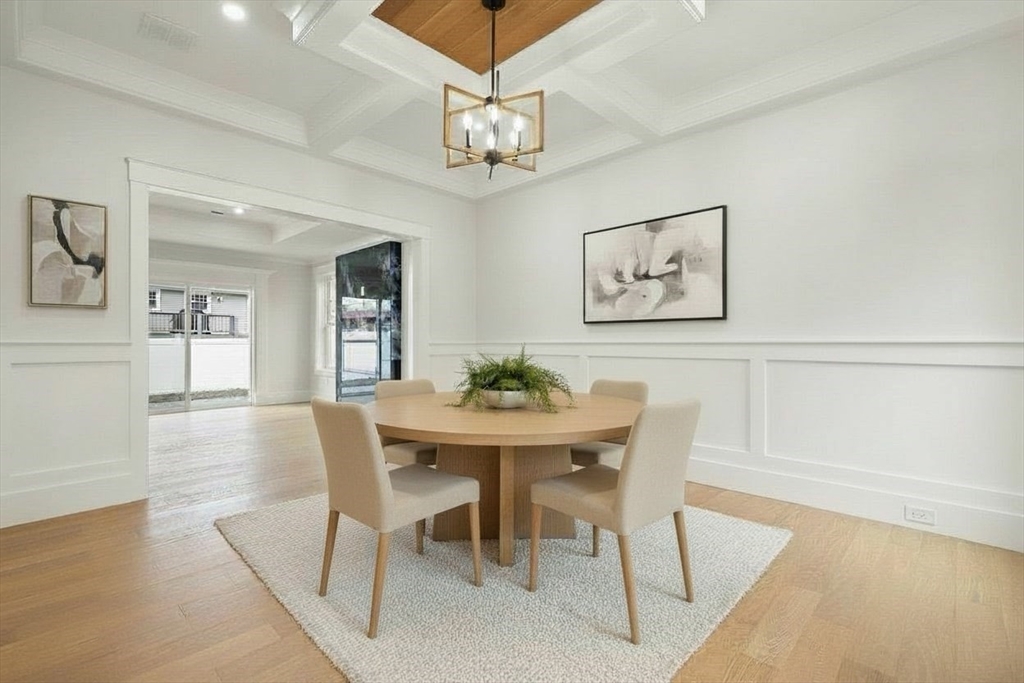 44 Buffington Street Attleboro, MA 02703 - Photo 8 of 41 a view of a dining room with furniture and wooden floor