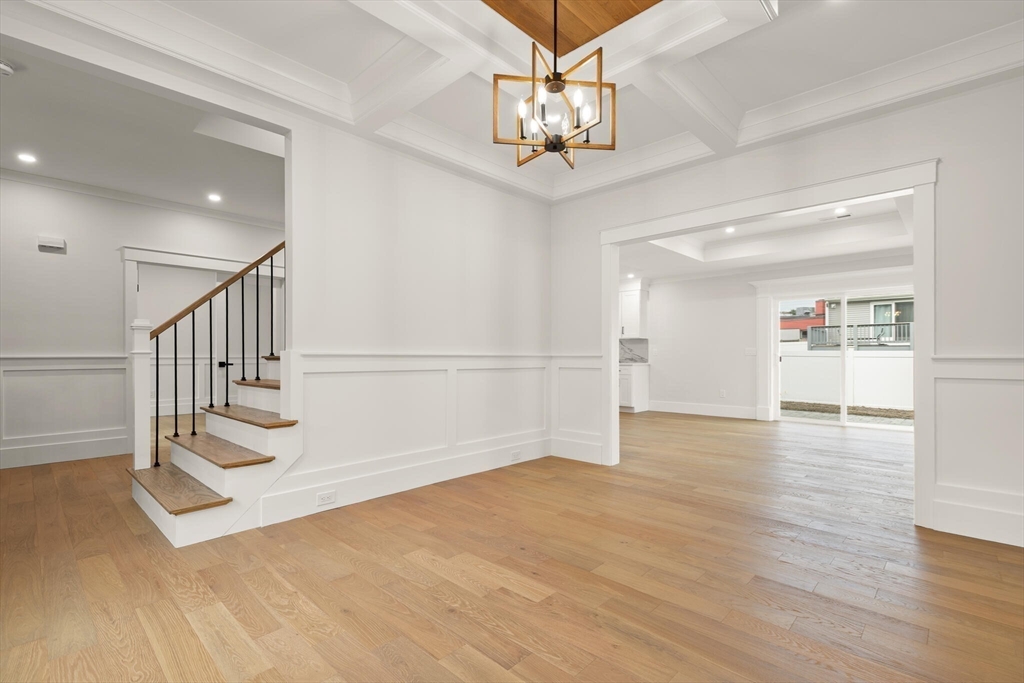 44 Buffington Street Attleboro, MA 02703 - Photo 9 of 41 a view of entryway and hall with wooden floor