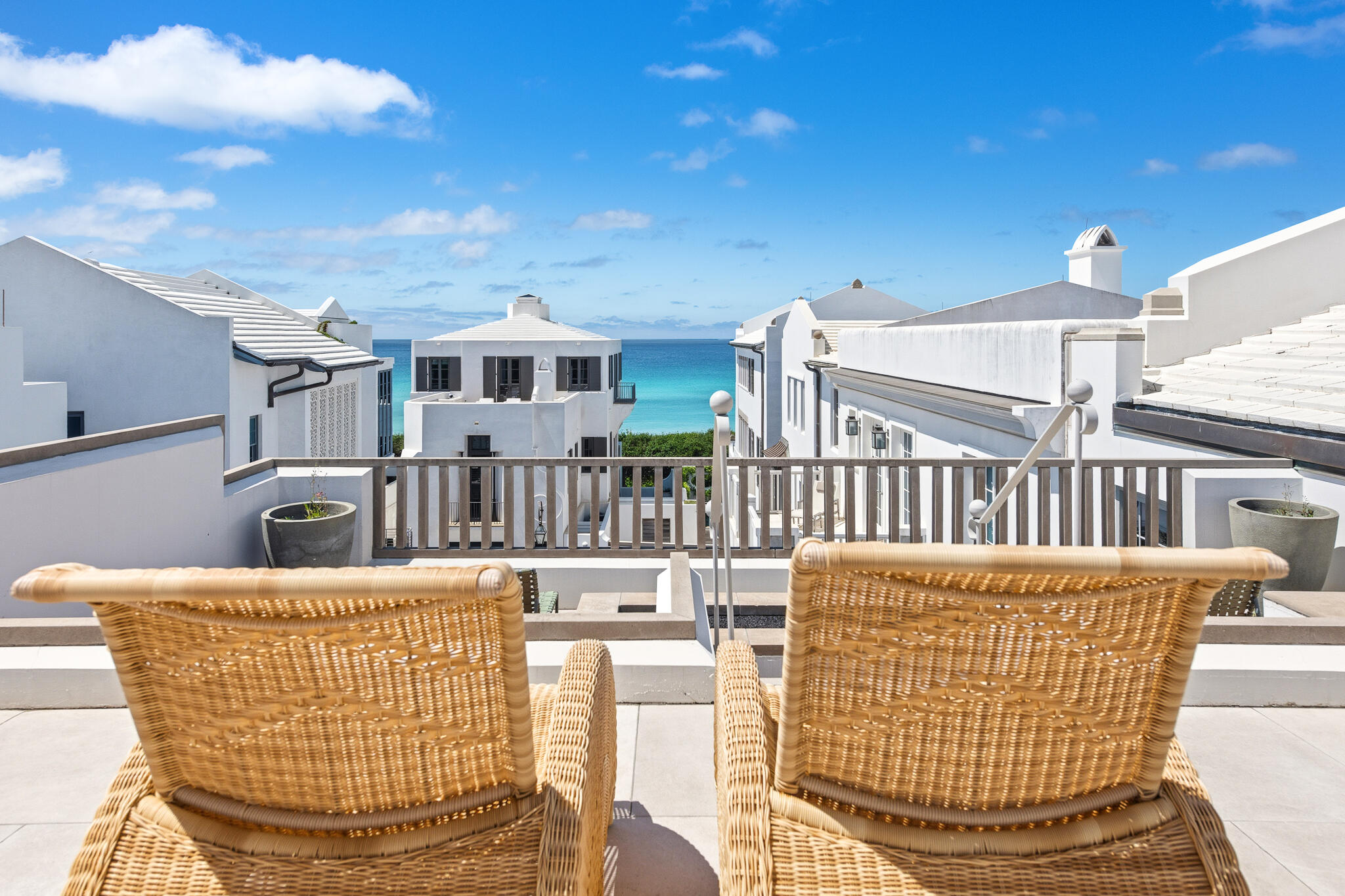 130 Sea Garden Street Inlet Beach, FL 32461 - Photo 60 of 77 a view of roof deck with dining table and chairs
