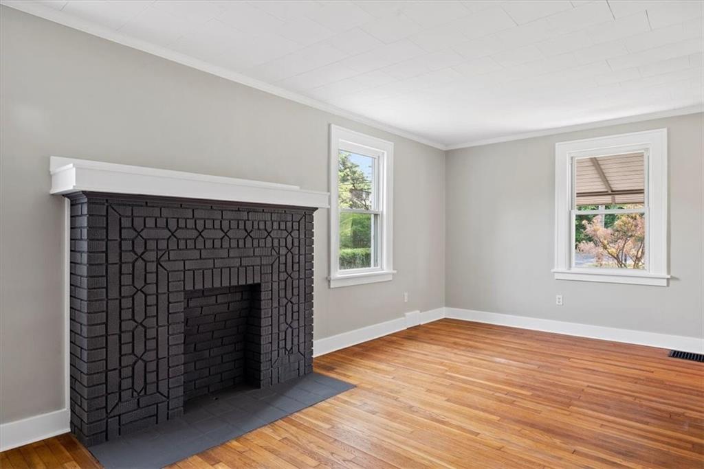 373 Goldsmith Road Pittsburgh, PA 15237 - Photo 11 of 40 wooden floor fireplace and windows in an empty room