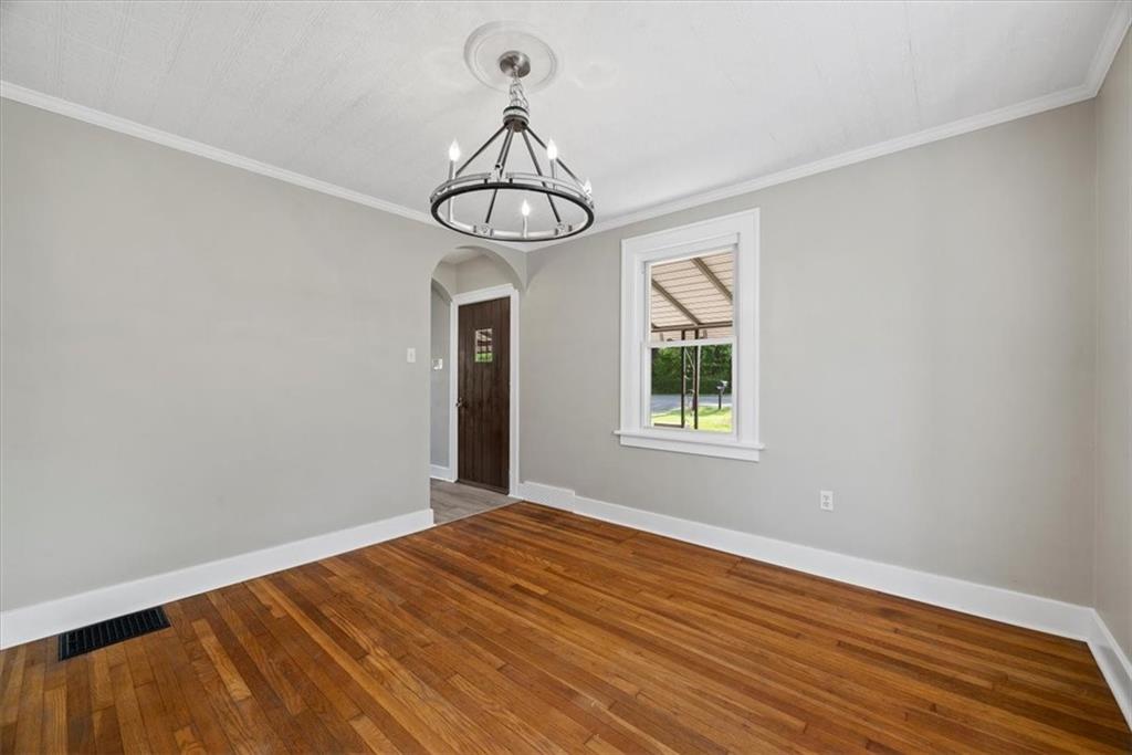 373 Goldsmith Road Pittsburgh, PA 15237 - Photo 17 of 40 a view of a room with wooden floor chandeliers and ceiling fan