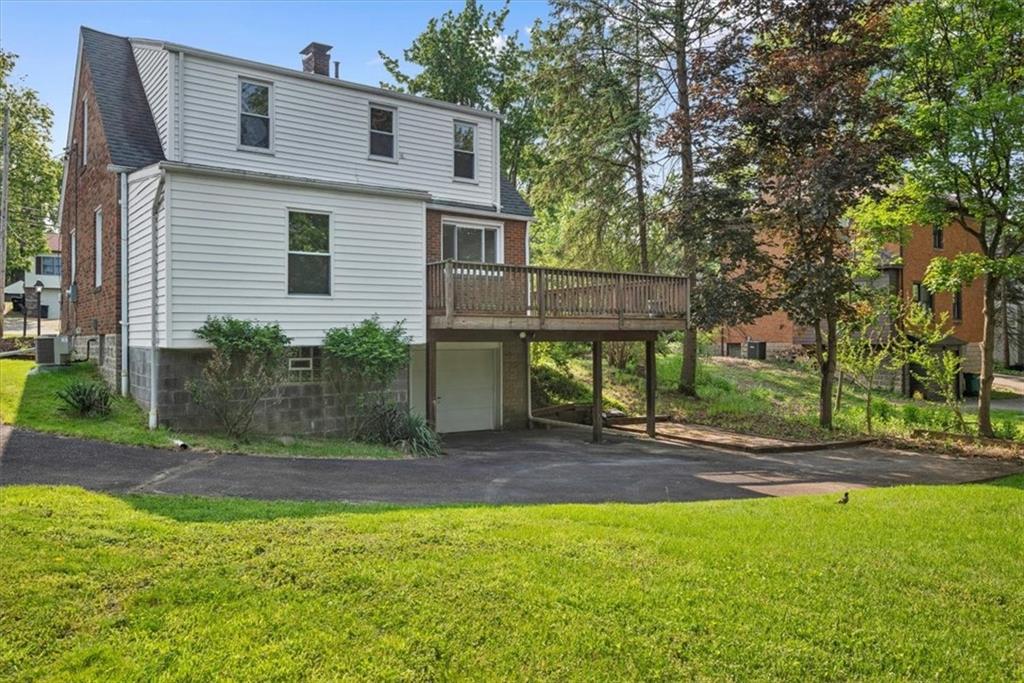 373 Goldsmith Road Pittsburgh, PA 15237 - Photo 36 of 40 a view of a house with backyard and a tree