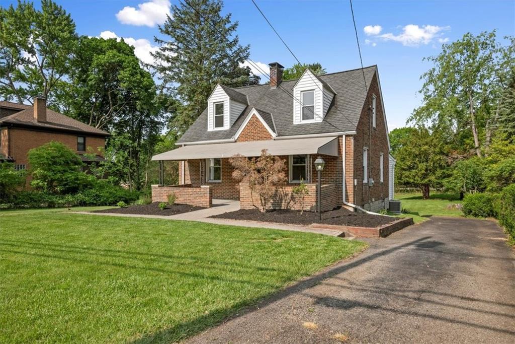 373 Goldsmith Road Pittsburgh, PA 15237 - Photo 40 of 40 a front view of a house with a yard table and chairs