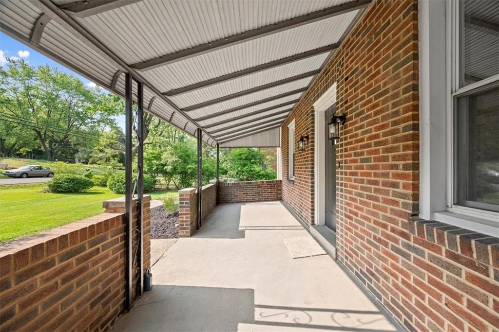 373 Goldsmith Road Pittsburgh, PA 15237 - Photo 4 of 40 a view of a patio with dining table and chairs with wooden floor