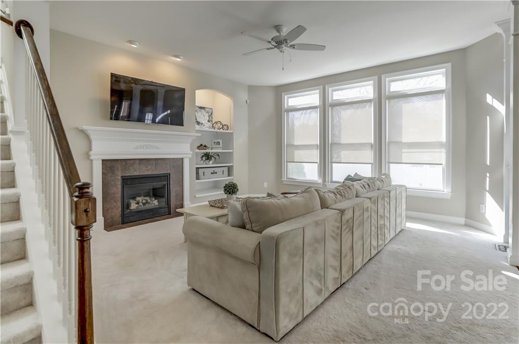 329 Elis Way Fort Mill, SC 29708 - Photo 12 of 36 a living room with furniture and a fireplace