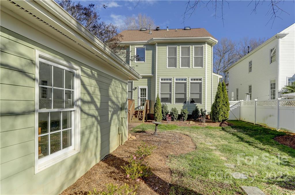 329 Elis Way Fort Mill, SC 29708 - Photo 36 of 36 a view of a brick building next to a yard