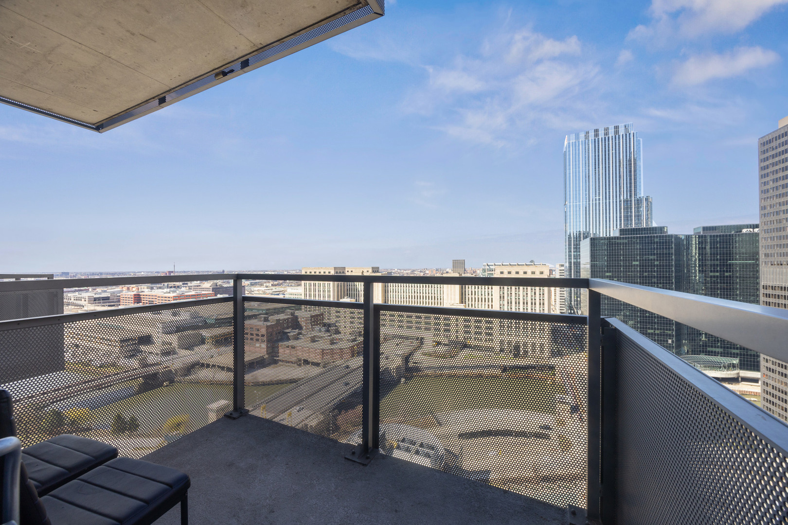 235 West Van Buren Street, Unit 2513 Chicago, IL 60607 - Photo 14 of 18 a view of balcony with staircase
