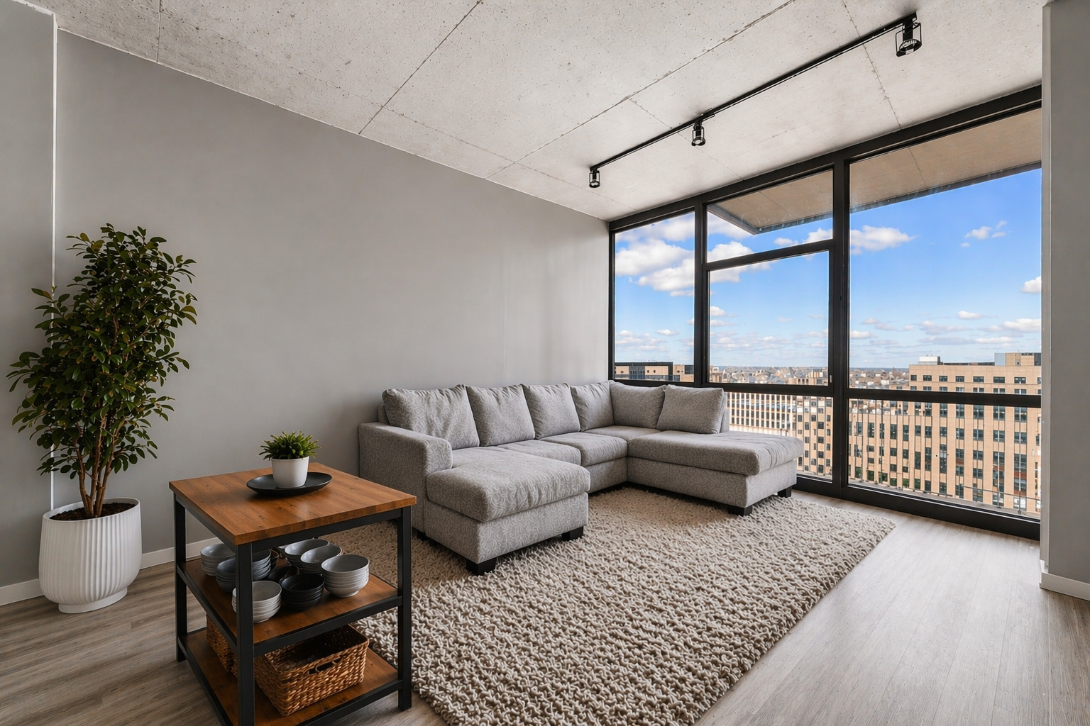235 West Van Buren Street, Unit 2513 Chicago, IL 60607 - Photo 2 of 18 a living room with furniture and a large window