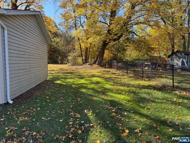 a view of yard covered with snow