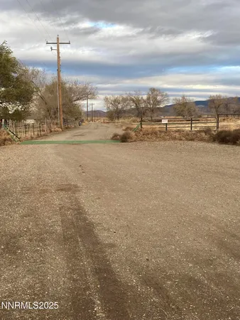 a view of a street with fire pit
