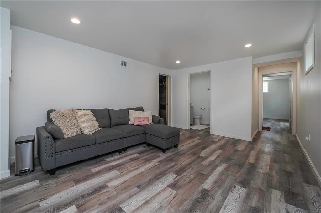 1073 Crest Drive Crescent, PA 15046 - Photo 25 of 33 a living room with furniture and a wooden floor