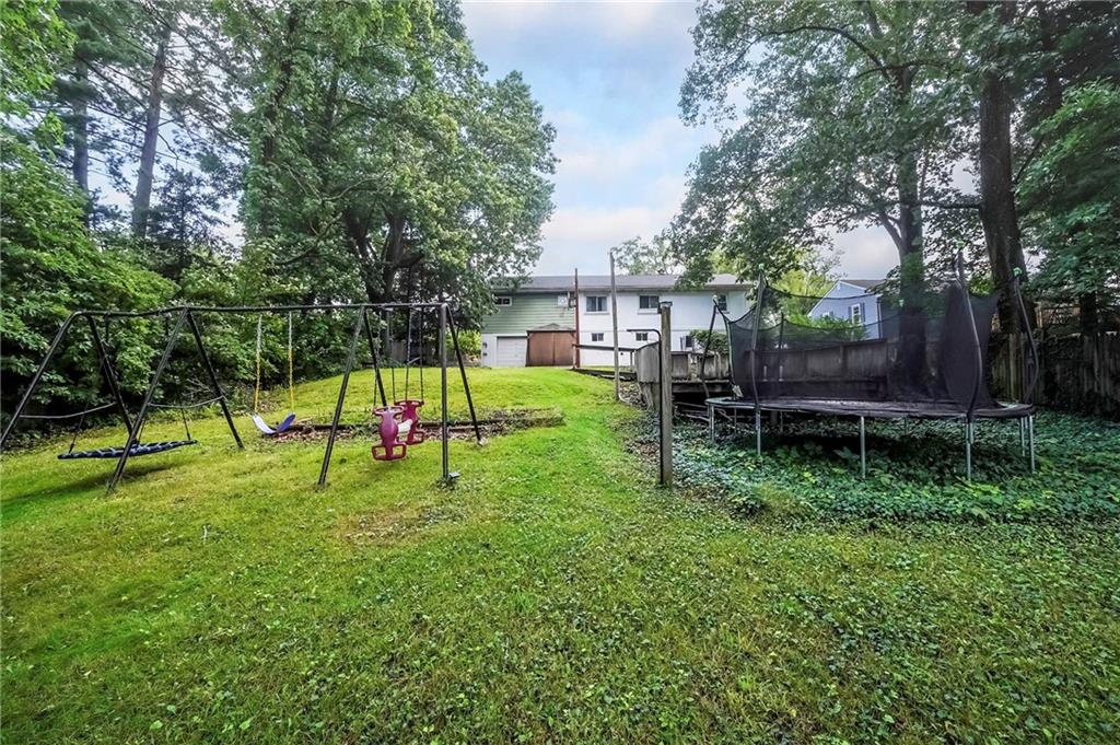 1073 Crest Drive Crescent, PA 15046 - Photo 30 of 33 a view of park with a slide trees and wooden fence