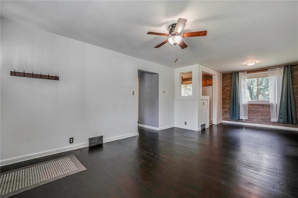 1073 Crest Drive Crescent, PA 15046 - Photo 3 of 33 a view of an empty room with a window and wooden floor