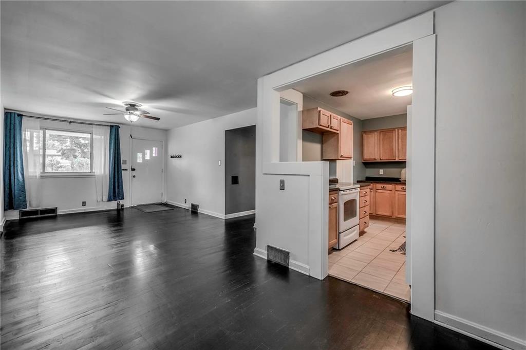 1073 Crest Drive Crescent, PA 15046 - Photo 6 of 33 a view of a kitchen with refrigerator and wooden floor
