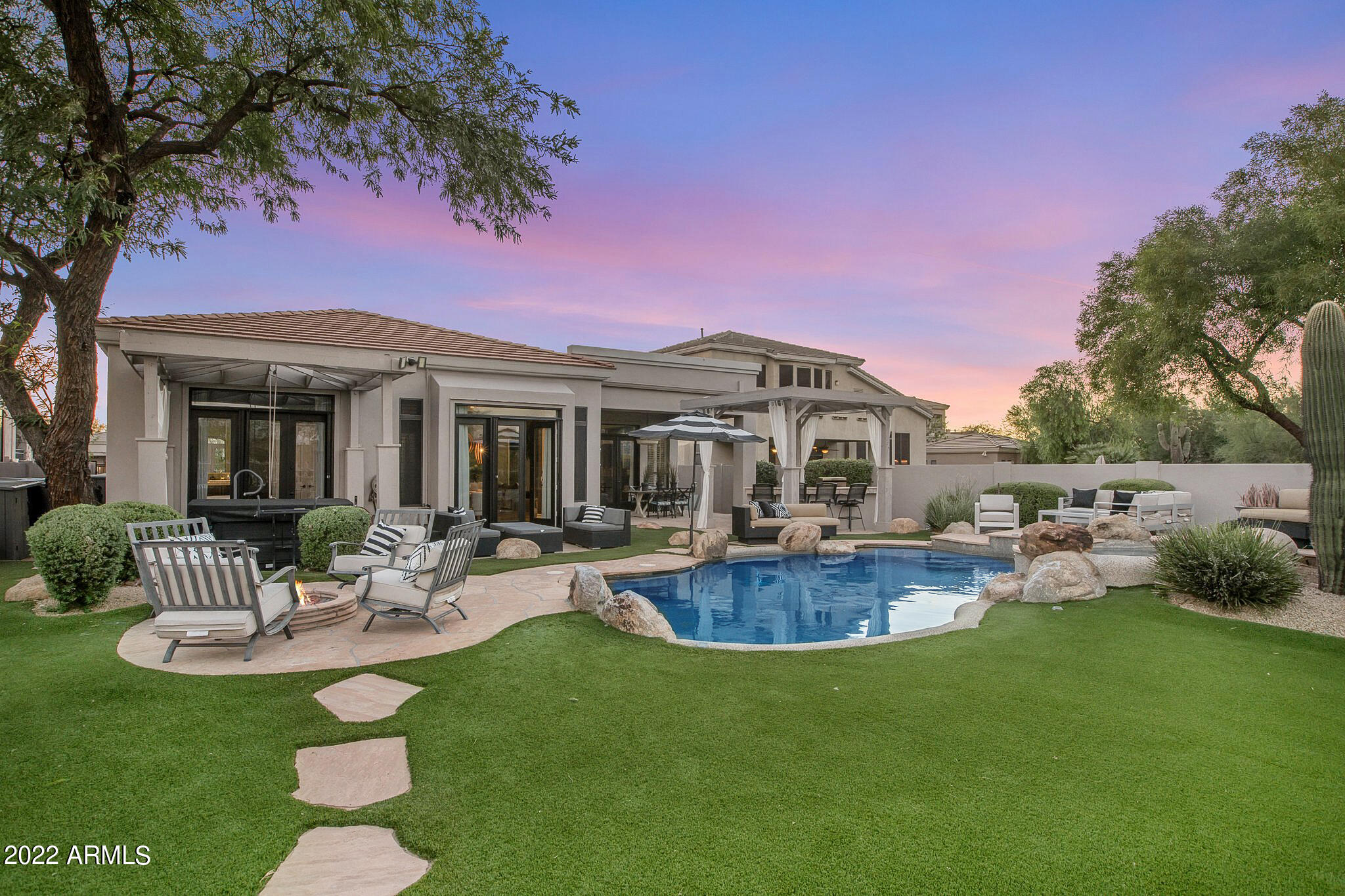 5222 East Hashknife Road Phoenix, AZ 85054 - Photo 2 of 52 Gorgeous Backyard with Turf