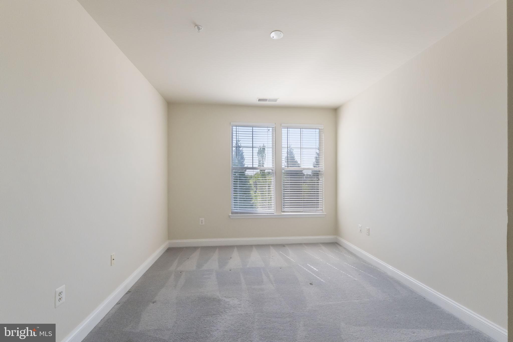 12824 Clarksburg Square Road, Unit 204 Clarksburg, MD 20871 - Photo 19 of 45 Primary bedroom