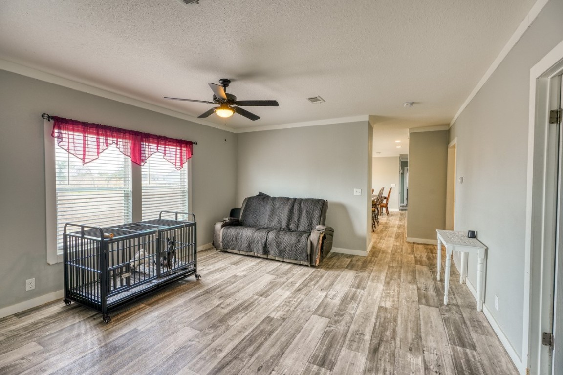 101 Samuel Drive Bertram, TX 78605 - Photo 15 of 30 a living room with furniture and a large window