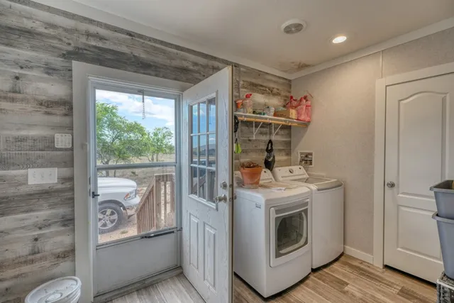 a view of livingroom with furniture and wooden floor