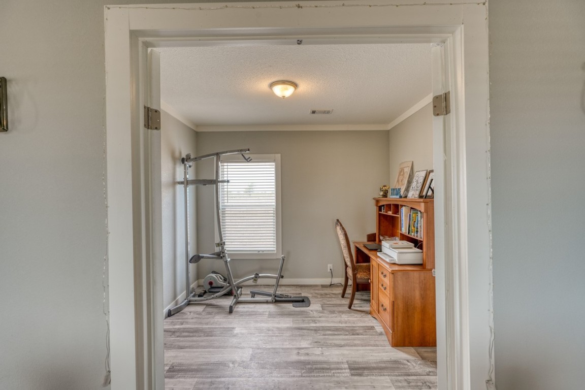 101 Samuel Drive Bertram, TX 78605 - Photo 17 of 30 a view of a hallway with seating area