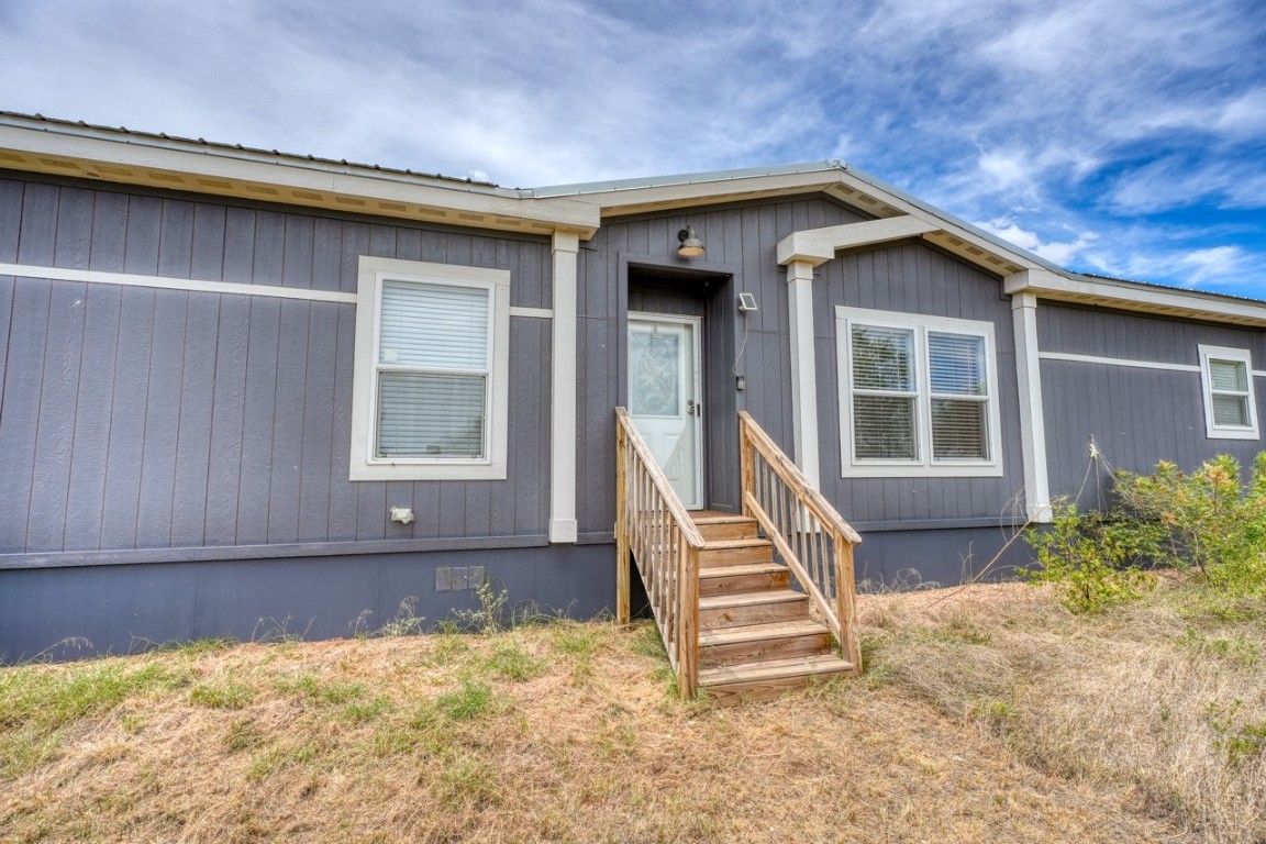 101 Samuel Drive Bertram, TX 78605 - Photo 6 of 30 a view of front door of house with stairs