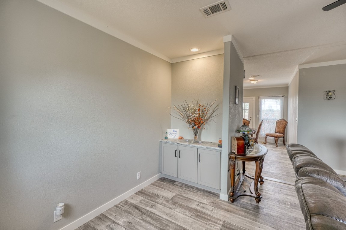 101 Samuel Drive Bertram, TX 78605 - Photo 7 of 30 a room with furniture and wooden floor