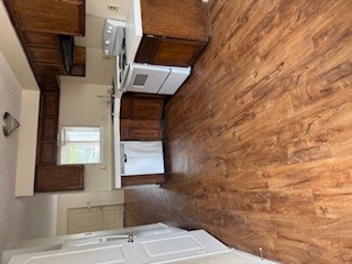 307 West William Cannon Drive, Unit A Austin, TX 78745 - Photo 4 of 14 a kitchen with stainless steel appliances granite countertop a stove a sink dishwasher and a refrigerator